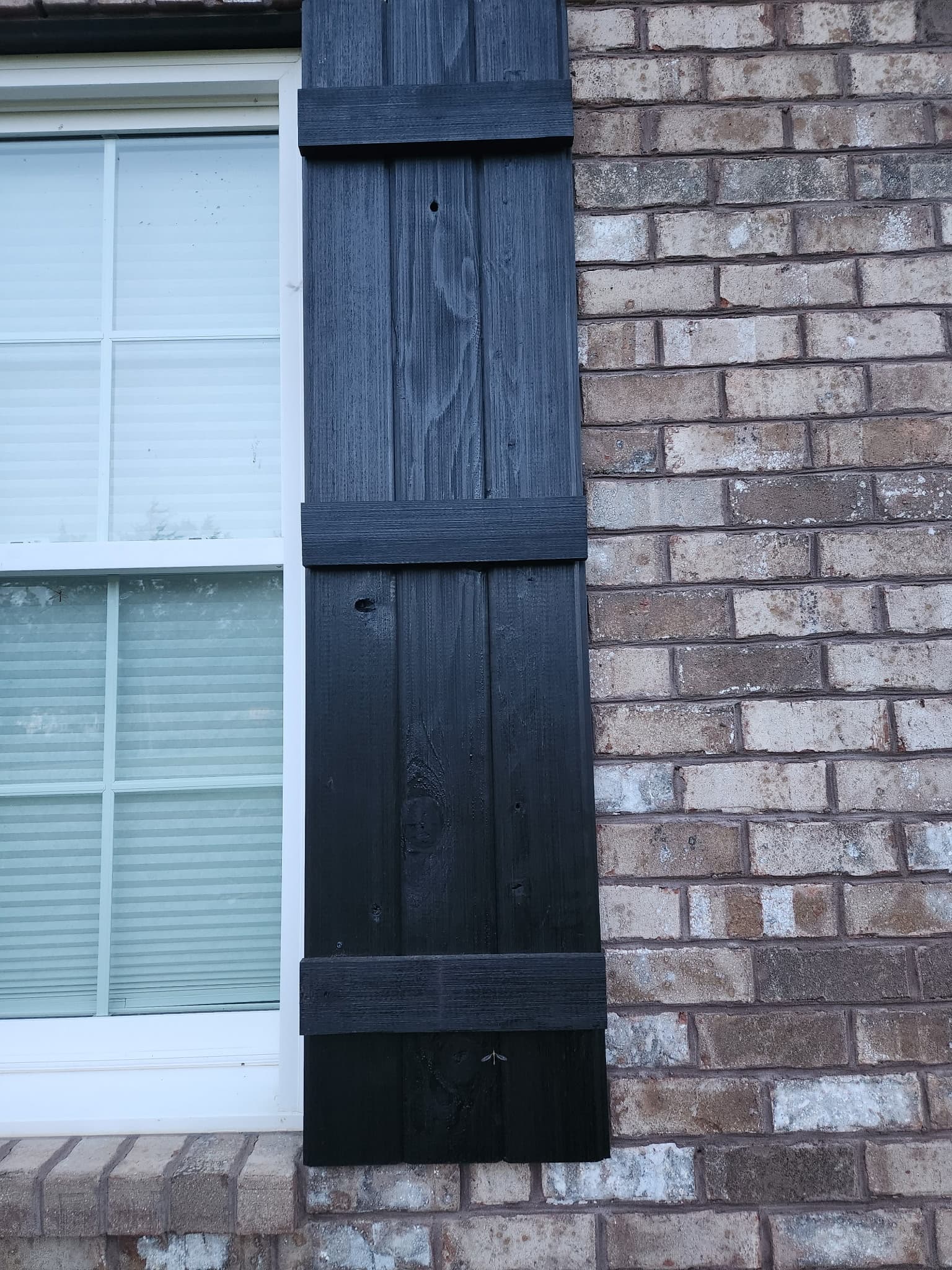 Closeup detail of a 3-batten cedar shutter
