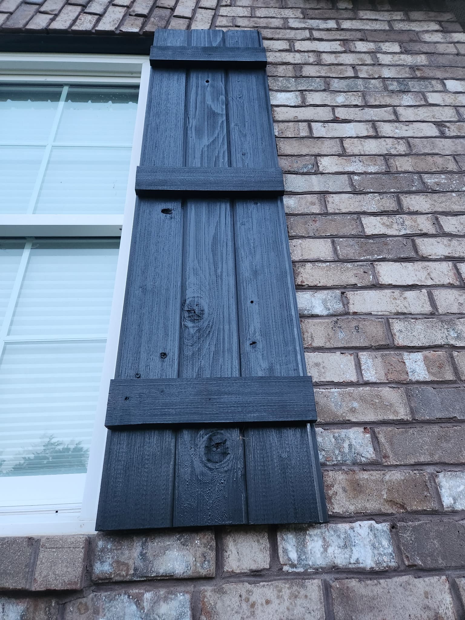 Macro closeup of Western Red Cedar grain through black stain