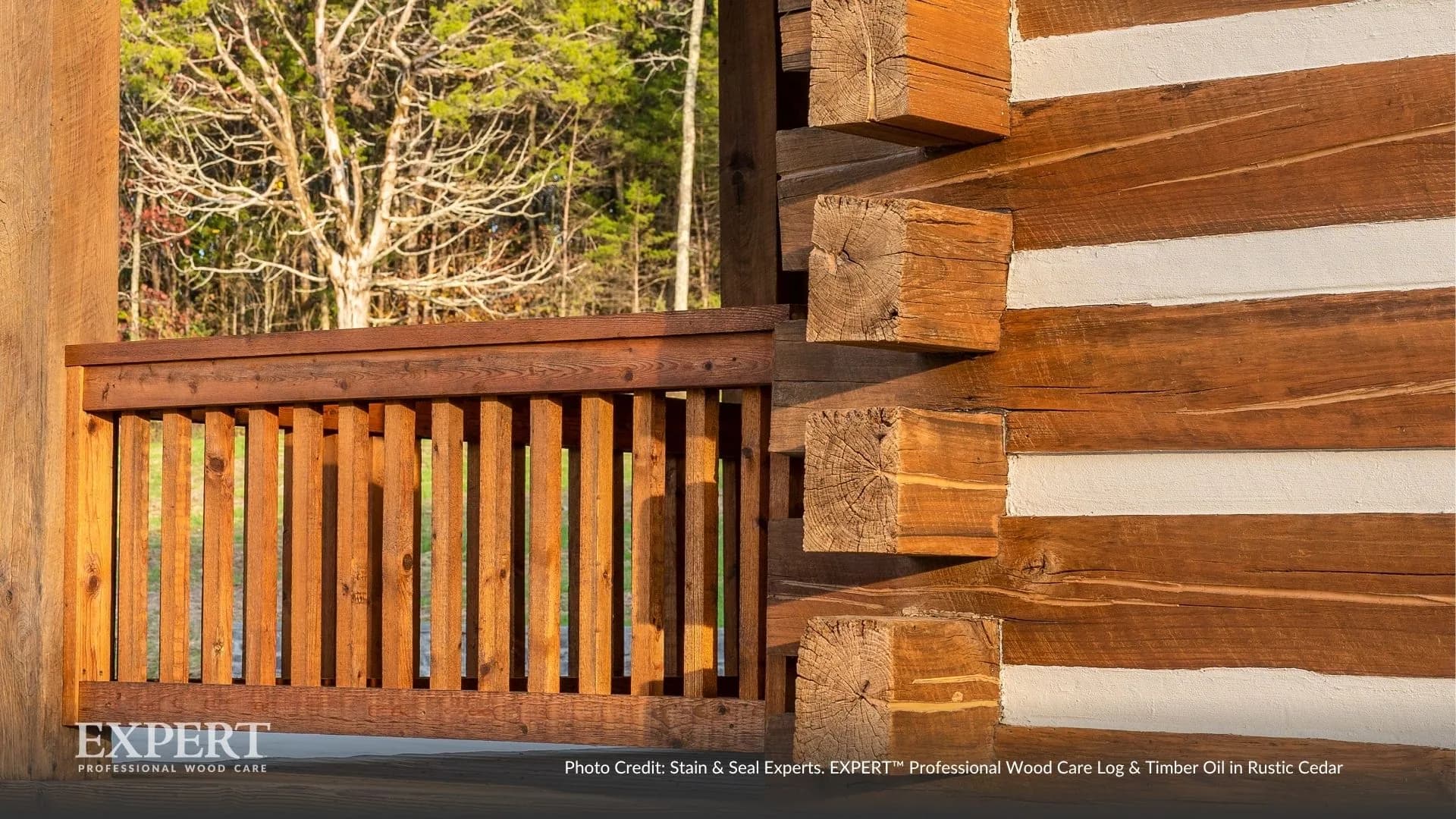 Log home corner and porch railing finished with EXPERT Log & Timber