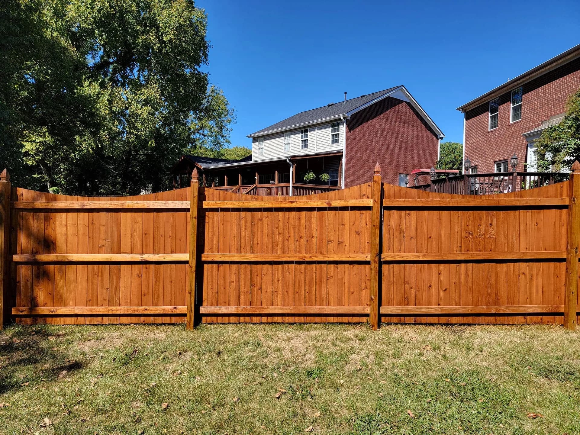 The same privacy fence after EXPERT Stain & Seal in Cedar