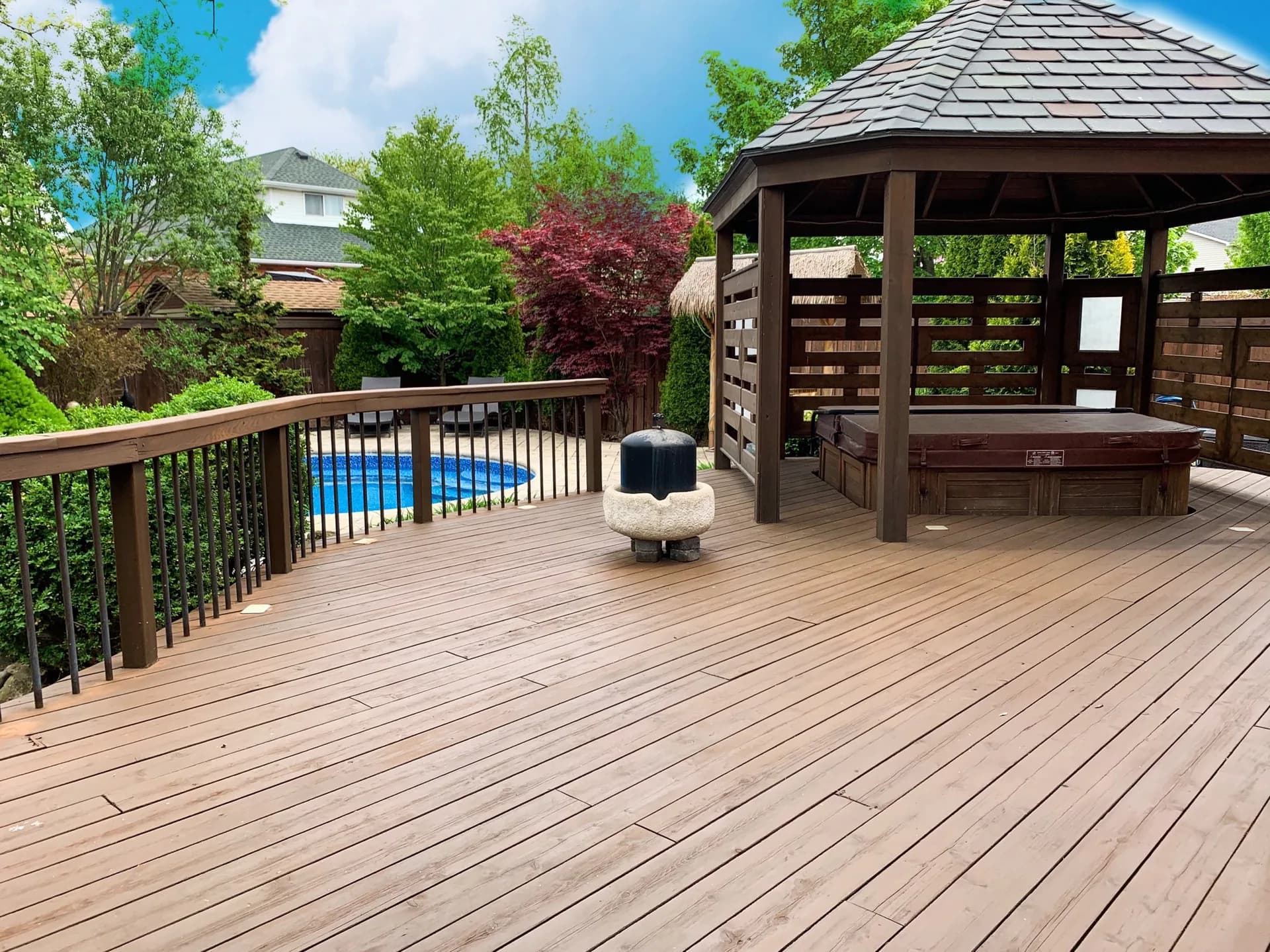 Pool deck and gazebo finished with EXPERT Stain & Seal in Sable
