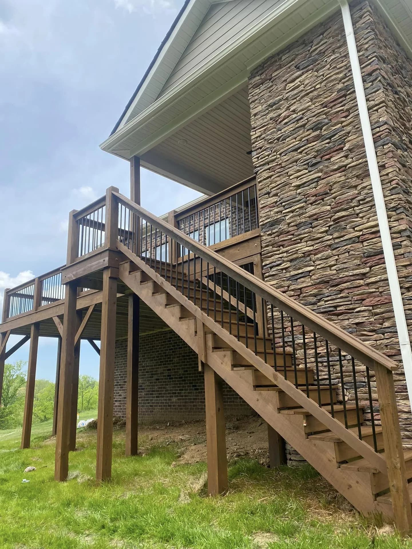 Exterior stairs and deck finished with EXPERT Stain & Seal in Sable