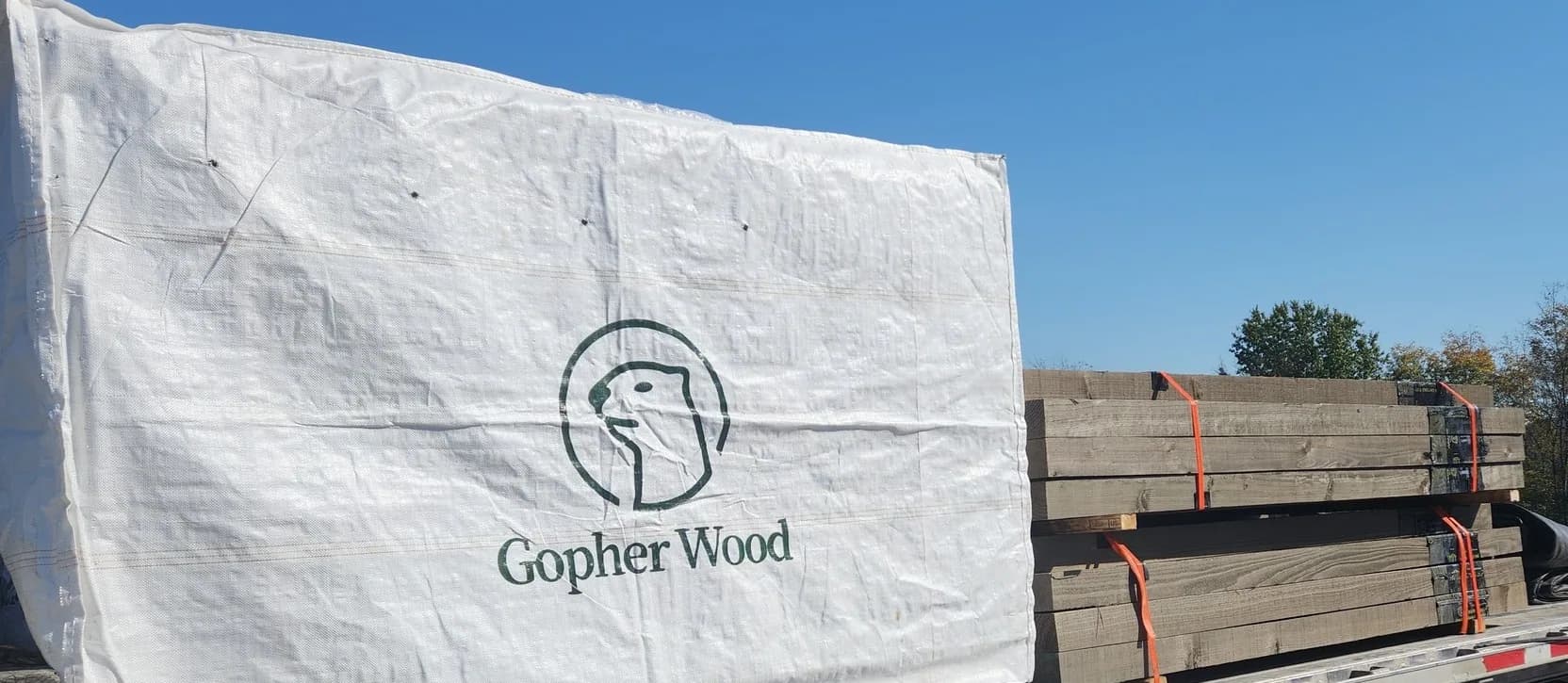 Wrapped Gopher Wood factory-finished lumber bundles