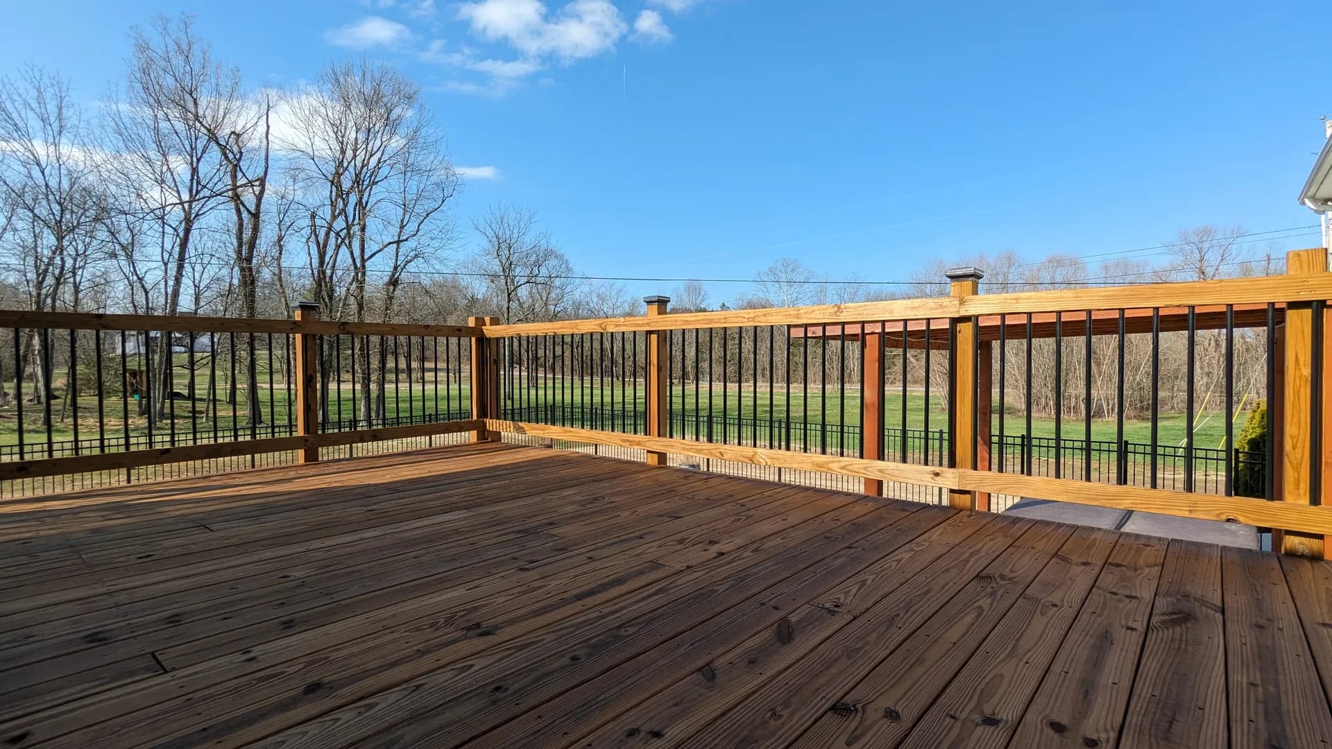 Large covered deck stained in EXPERT Pecan