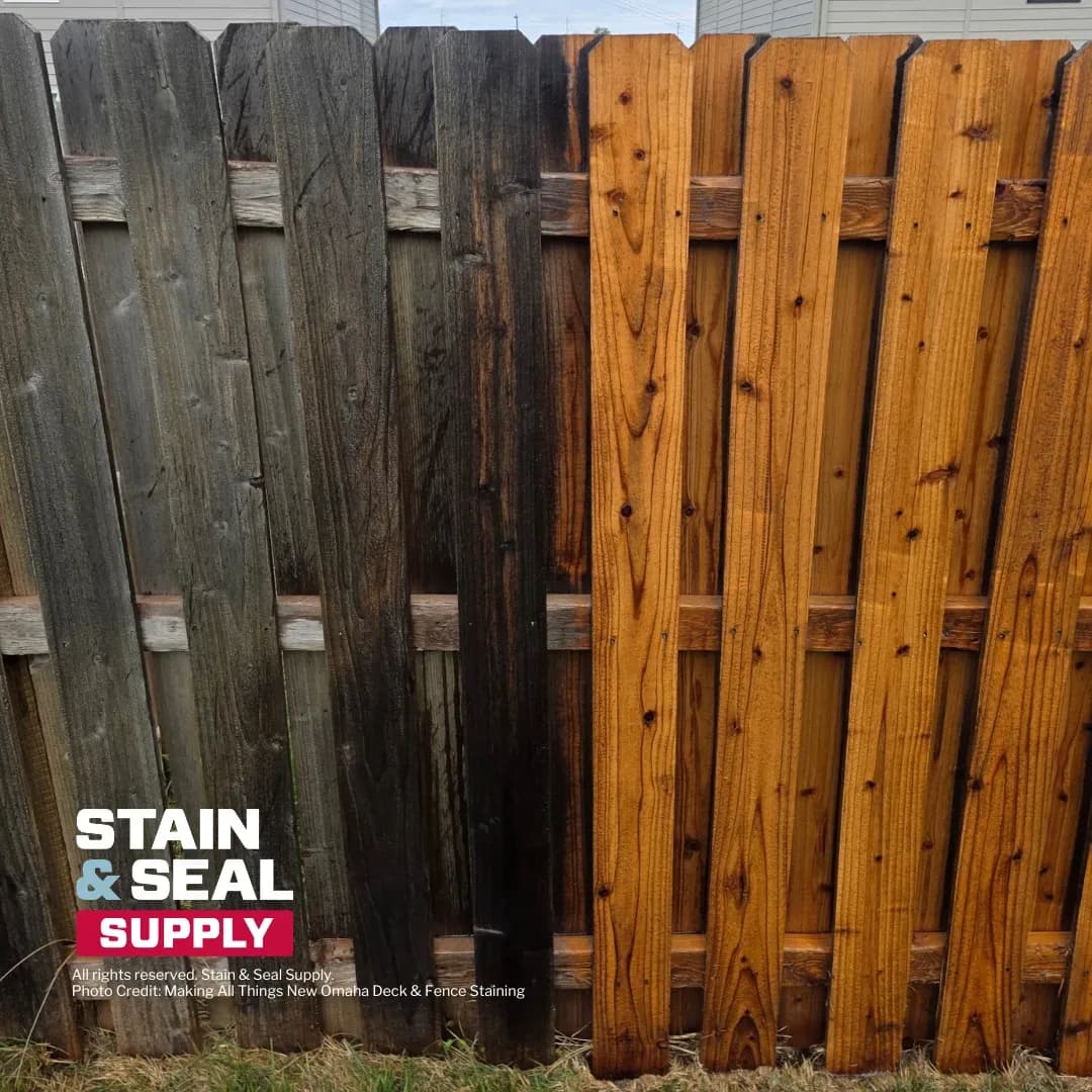 Fence half weathered and half freshly stained